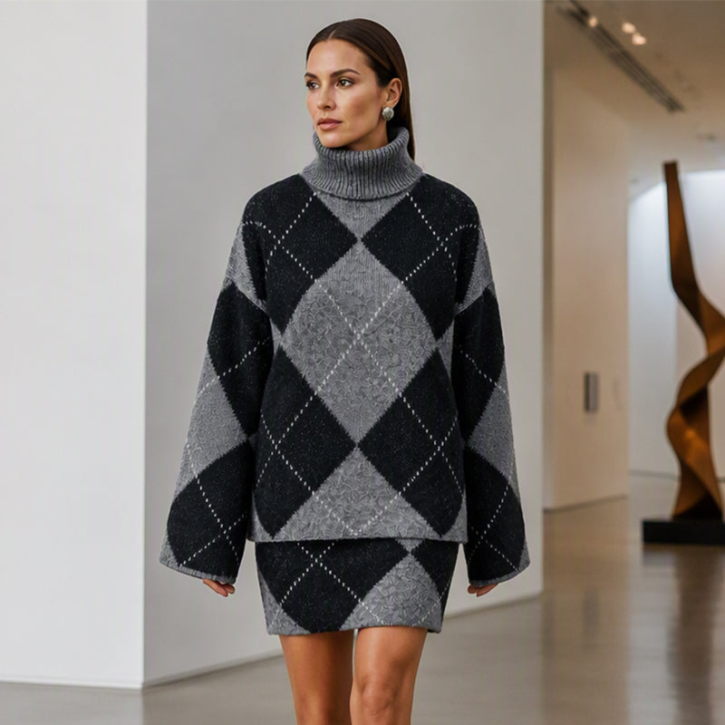 Completo donna in maglia con maglione a collo alto e gonna argyle