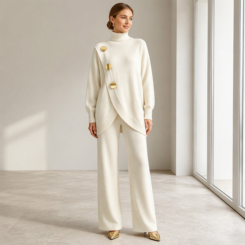 Completo donna in maglia con top asimmetrico e pantaloni palazzo