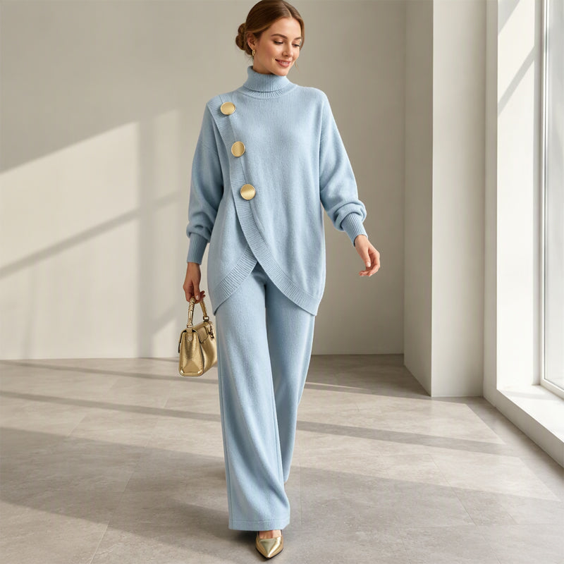 Completo donna in maglia con top asimmetrico e pantaloni palazzo